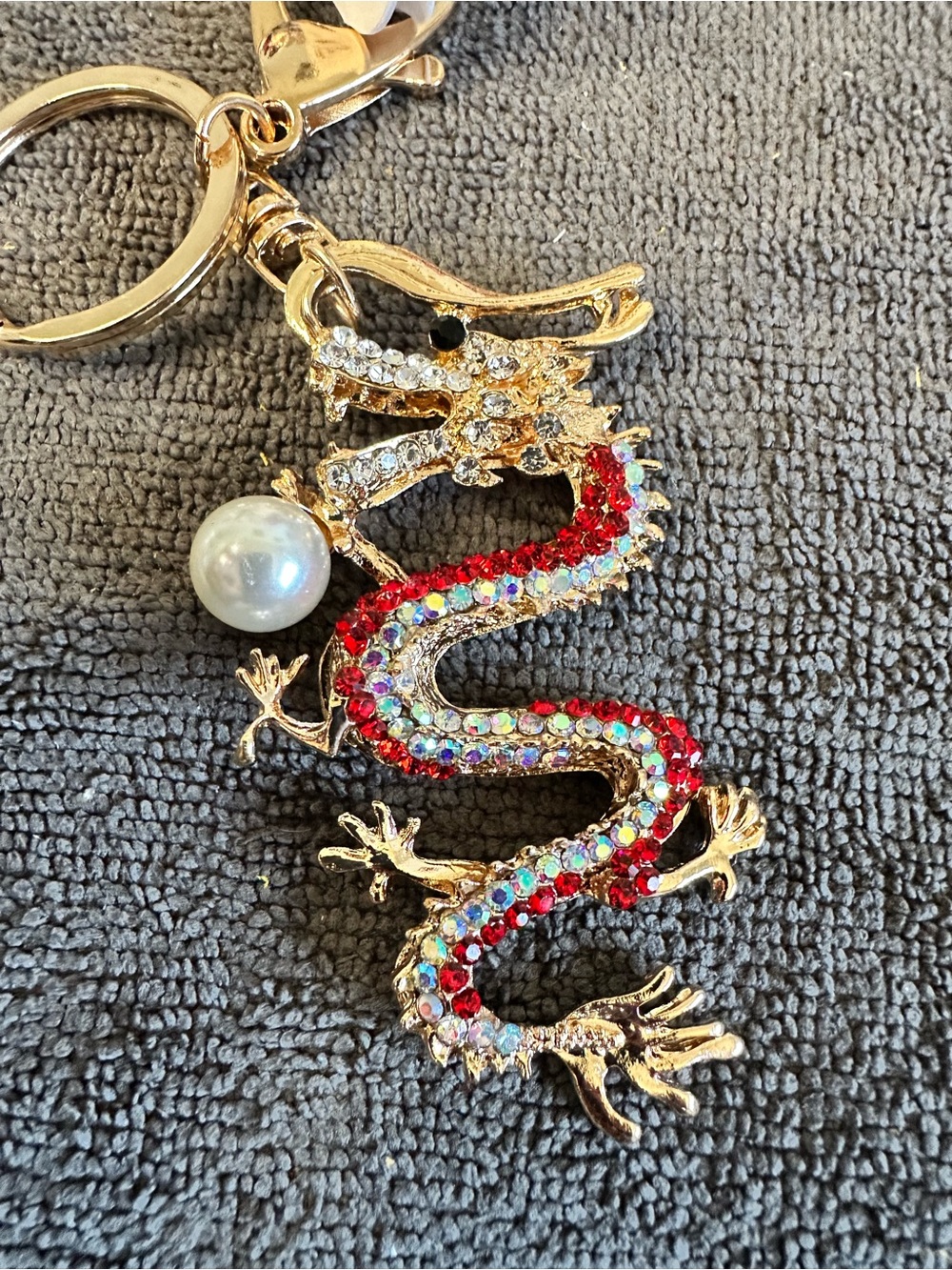 Unk Gold-Tone Dragon Keychain with Red and Iridescent Crystals and Pearl